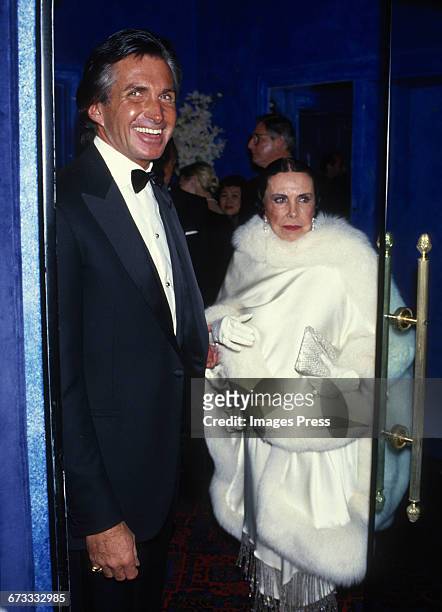 George Hamilton and his mother Ann Stevens attend the Grand Opening of newly refurbished Club El Morocco circa 1987 in New York City.
