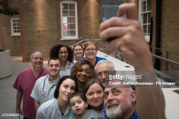 Labour leader Jeremy Corbyn poses for a selfie with NHS nurses, student nurses and midwives, after meeting them to discuss Labour&acirc;s three point...