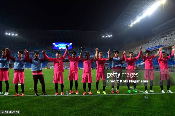 Layers of Kashima Antlers celebrate with supoeters after winning the game during the AFC Champions League Group E match between Ulsan Hyundai FC v...