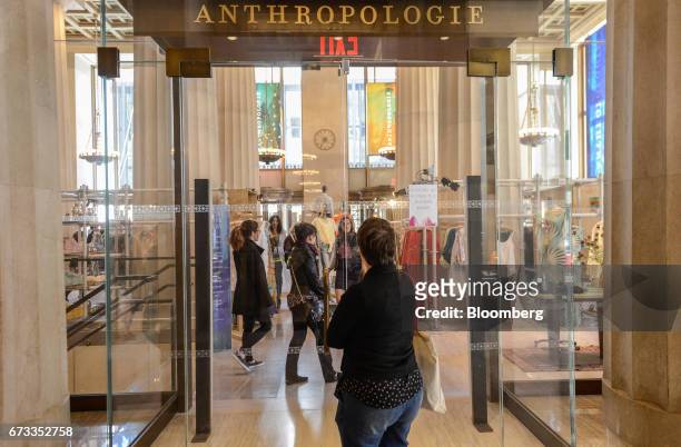 Shopper enters an Anthropologie Inc. Store in New York, U.S., on Thursday, April 13, 2017. Bloomberg is scheduled to release U.S. Weekly consumer...