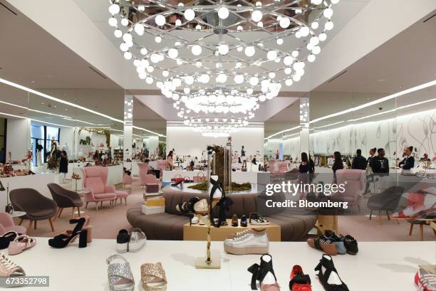 Shoes are displayed for sale at a Saks Fifth Avenue Inc. Store inside Brookfield Place in New York, U.S., on Thursday, April 13, 2017. Bloomberg is...