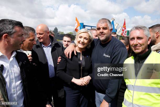 French far-right political party National Front and President French presidential election candidate, Marine Le Pen poses for selfies with strike...