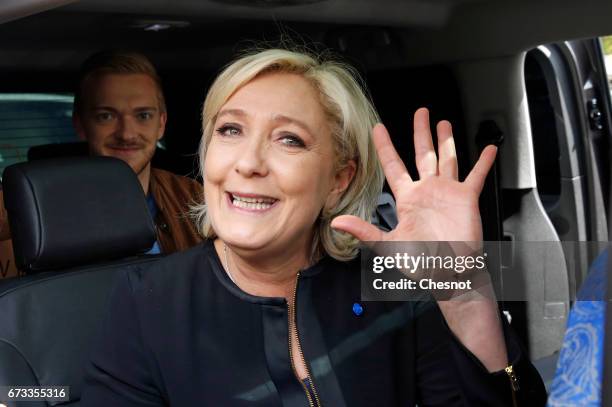 French far-right political party National Front and President French presidential election candidate, Marine Le Pen waves after her visit with strike...