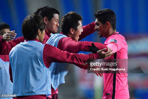 Pedro Junior of Kashima Antlers celebrates scoring his teams's second goal with his teammates during the AFC Champions League Group E match between...