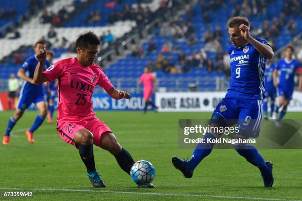 Yasushi Endo of Kashima Antlers and Mislav Orsic of Ulsan Hyundai FC compete for thr bsll during the AFC Champions League Group E match between Ulsan...