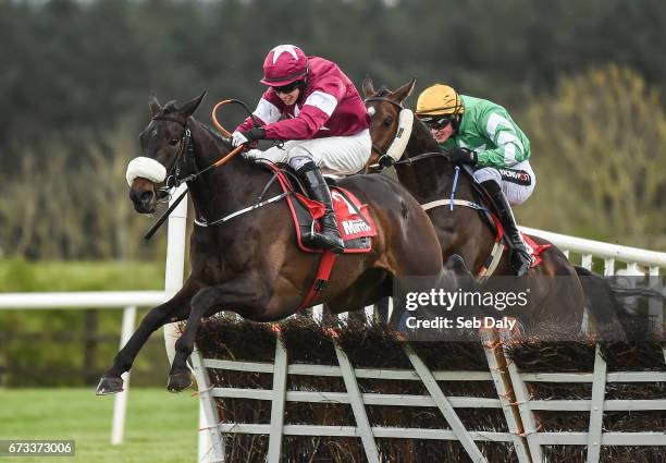 Kildare , Ireland - 26 April 2017; Champagne Classic, left, with Bryan Cooper up, jump the last on their way to winning the Irish Daily Mirror Novice...