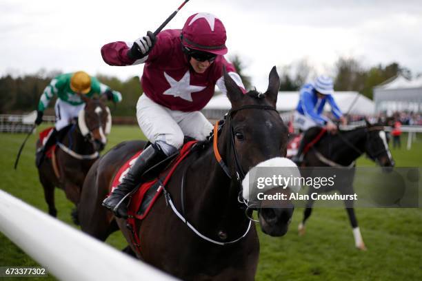 Bryan Cooper riding Champagne Classic clear the last to win The Irish Daily Mirror Novice Hurdle from Penhill at Punchestown racecourse on April 26,...