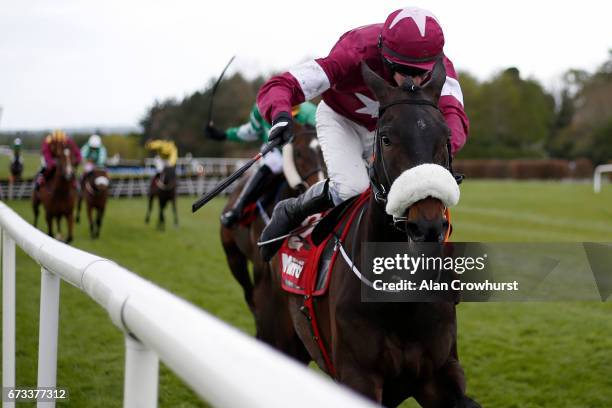 Bryan Cooper riding Champagne Classic clear the last to win The Irish Daily Mirror Novice Hurdle at Punchestown racecourse on April 26, 2017 in Naas,...