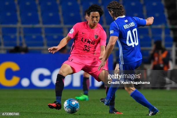 Mu Kanazaki of Kashima Antlers and Richard Windbichler of Ulsan Hyundai FC compete the ball during the AFC Champions League Group E match between...