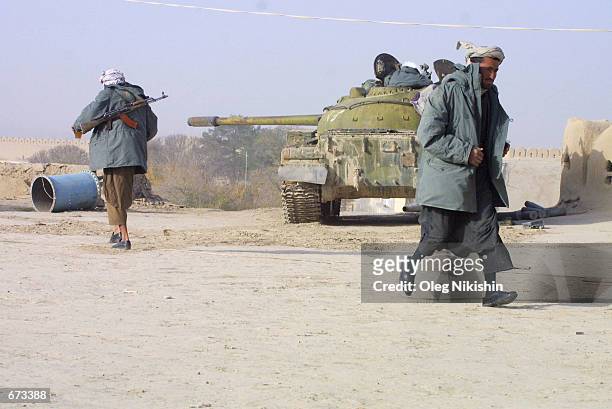 Northern alliance fighters occupy a fortress November 26, 2001 near Mazar-e-Sharif, Afghanistan. Anti-Taliban fighters were joined by some U.S....