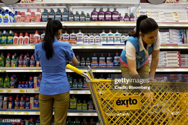 Employees restock dental care products on shelves inside an Almacenes Exito SA store in Bogota, Colombia, on Thursday, April 20, 2017. The Foundation...