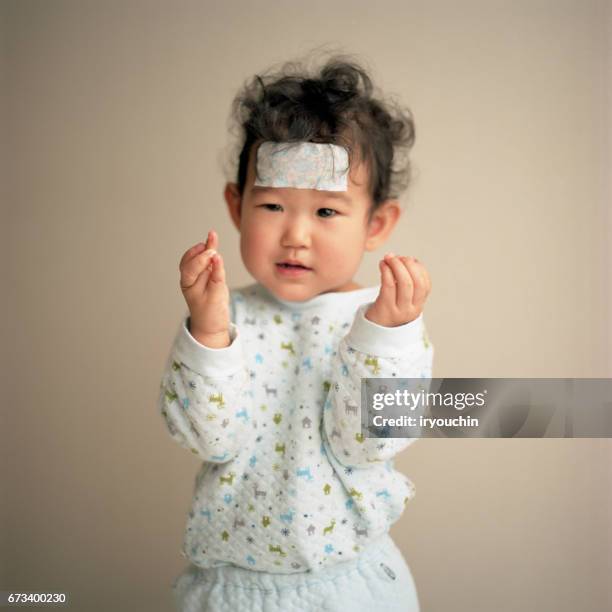 a cold baby - antipyretic stock pictures, royalty-free photos & images