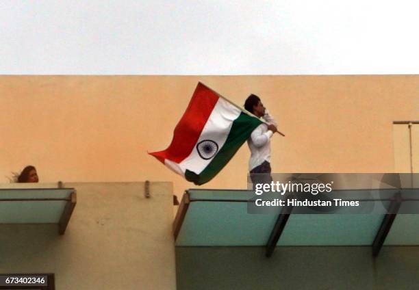 Patriotism - Independence Day - Indian National Flag - Tricolour - Shahrukh Khan during a photoshoot on the terrace of his house near Bandstand on...