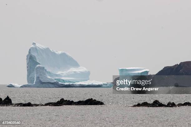 Large iceberg floats in the Atlantic Ocean, April 26, 2017 off the coast of Ferryland, Newfoundland, Canada. Icebergs break off from Baffin Island...