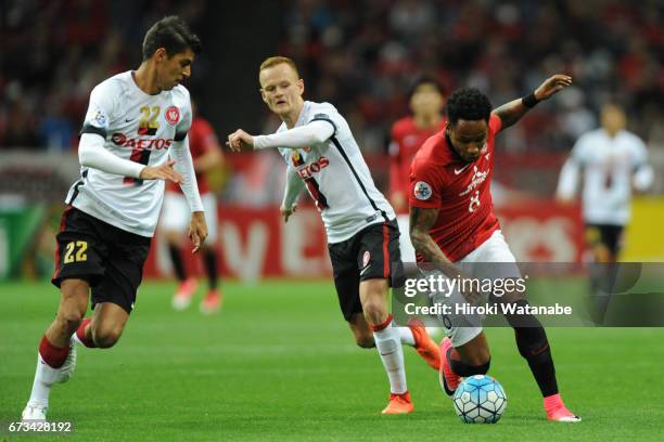 Jonathan Aspropotamitis of Western Sydney and Rafael Silva of Urawa Red Diamonds compete for the ball during the AFC Champions League Group F match...
