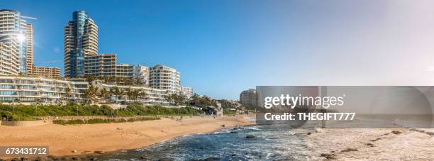 umhlanga rocks holiday flats panorama with the seaside - strand south africa stock pictures, royalty-free photos & images