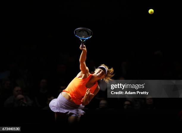 Maria Sharapova of Russia serves during her match against Roberta Vinci of Italy during the Porsche Tennis Grand Prix at Porsche Arena on April 26,...