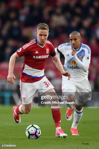 Wahbi Khazri of Sunderland chases down Adam Forshaw of Middlesbrough during the Premier League match between Middlesbrough and Sunderland at the...