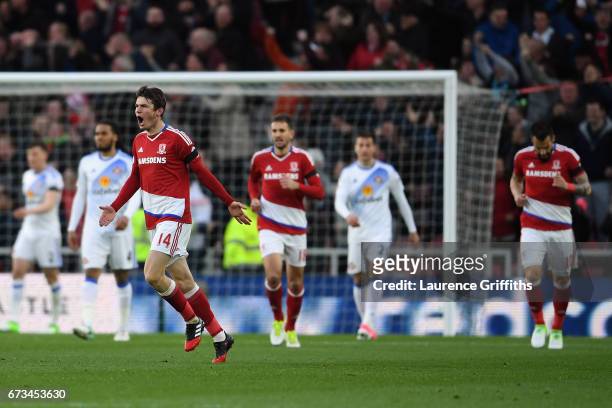 Marten de Roon of Middlesbrough celebrates scoring his sides first goal with team mates during the Premier League match between Middlesbrough and...