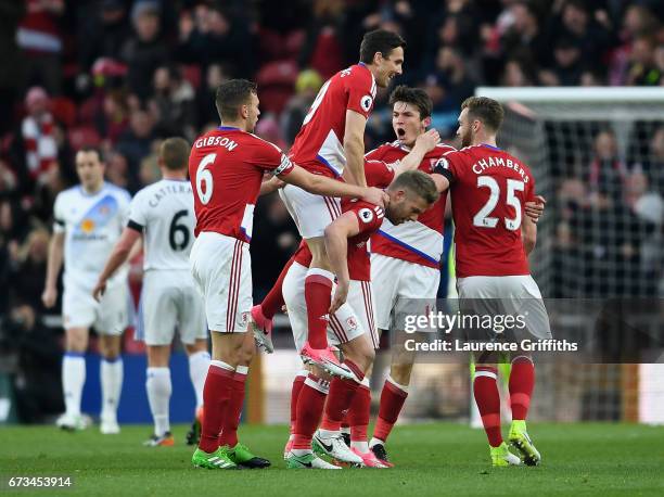 Marten de Roon of Middlesbrough celebrates scoring his sides first goal with team mates during the Premier League match between Middlesbrough and...