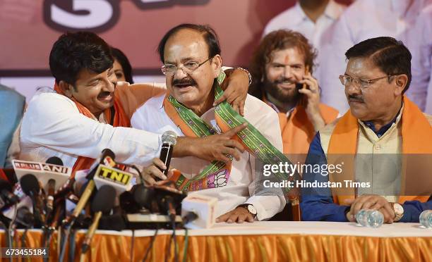 Delhi BJP President Manoj Tiwari along with Venkaiah Naidu during a press conference at Delhi BJP Office after party's victory in MCD elections on...
