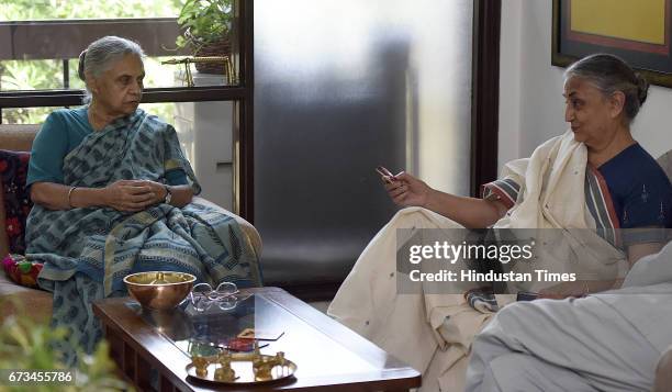 Veteran Congress leader and former Chief Minister of Delhi Sheila Dikshit with her sister talking to media persons after 2017 MCD election results at...