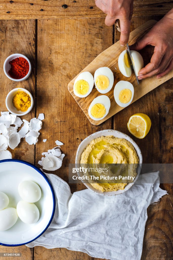 Making hummus deviled eggs