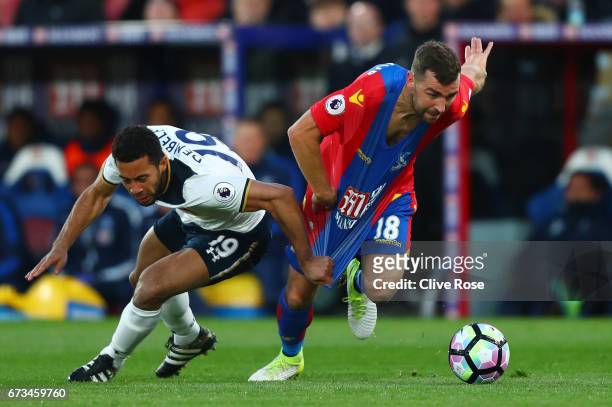 Mousa Dembele of Tottenham Hotspur pulls back James McArthur of Crystal Palace during the Premier League match between Crystal Palace and Tottenham...