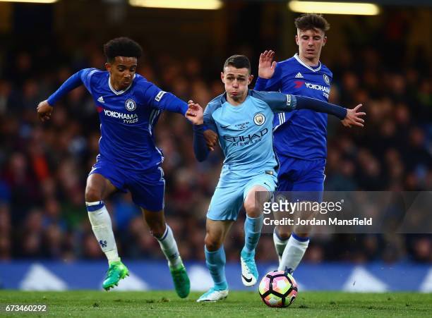 Jacob Maddox of Chelsea and Mason Mount of Chelsea put pressure on Matt Smith of Manchester City during the FA Youth Cup Final, second leg between...