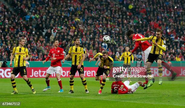 Javier Martinez of FC Bayern Muenchen after he heads the equalizing goal during the DFB Cup semi final match between FC Bayern Muenchen and Borussia...