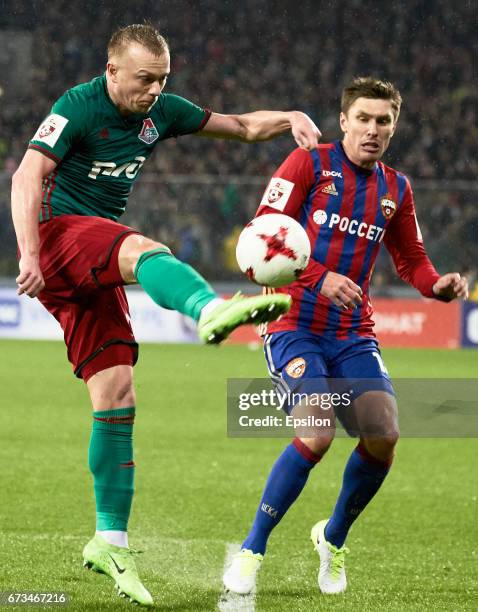 Kirill Nababkin of PFC CSKA Moscow challenged by Renat Yanbayev of FC Lokomotiv Moscow during the Russian Premier League match between PFC CSKA...