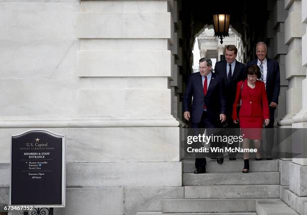 Sen. John Boozman , Sen. Joe Donnelly , Sen. Susan Collins and Sen. Jerry Moran depart the U.S. Capitol for a briefing on North Korea at the White...