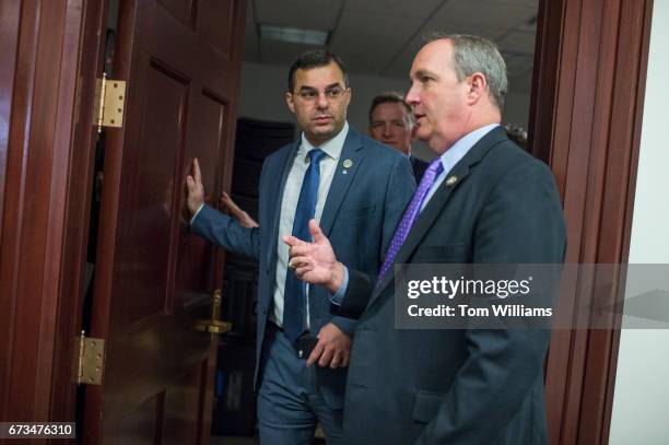 Reps. Justin Amash, R-Mich., left, and Jeff Duncan, R-S.C., leave a meeting of the House Republican Conference in the Capitol on April 26, 2017.