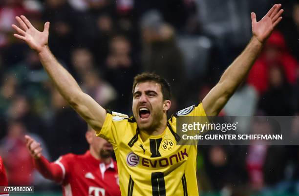 Dortmund's Greek defender Sokratis reacts during the German Cup DFB Pokal semifinal football match between FC Bayern Munich and BVB Borussia Dortmund...