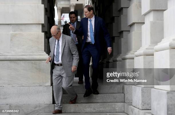 Sen. Pat Roberts and Sen. Ron Wyden depart the U.S. Capitol for a briefing on North Korea at the White House April 26, 2017 in Washington, DC....
