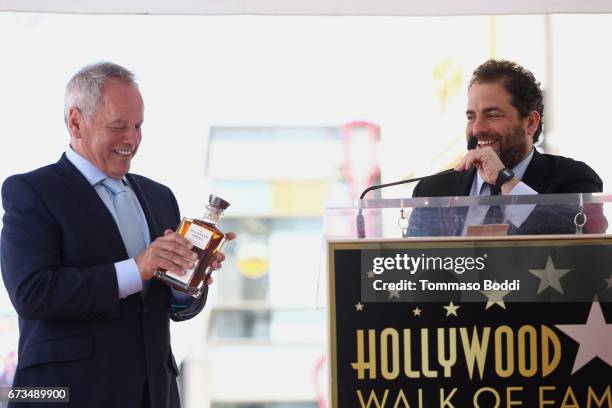 Wolfgang Puck and Brett Ratner attend a Ceremony Honoring Wolfgang Puck With Star On The Hollywood Walk Of Fame on April 26, 2017 in Hollywood,...