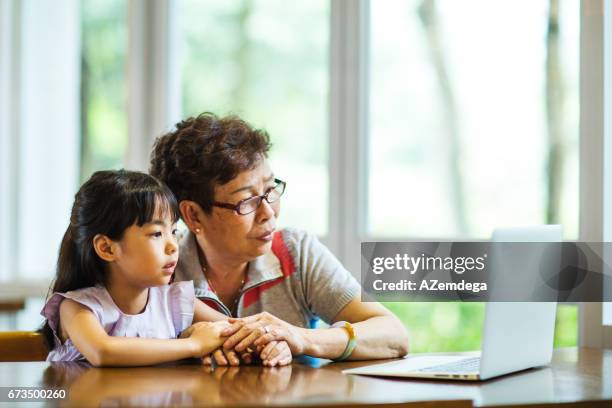 learning technologies - hong kong grandmother stock pictures, royalty-free photos & images