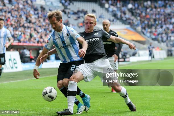 Stefan Aigner of 1860 Munich and Daniel Lukasik of Sandhausen battle for the ball during the Second Bundesliga match between TSV 1860 Muenchen and SV...