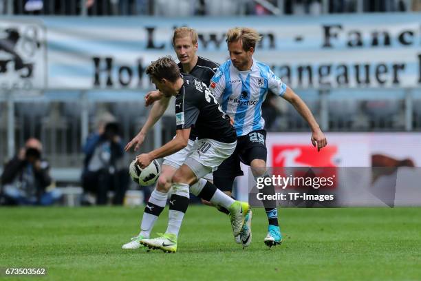 Stefan Aigner of 1860 Munich and Thomas Pledl of Sandhausen battle for the ball during the Second Bundesliga match between TSV 1860 Muenchen and SV...