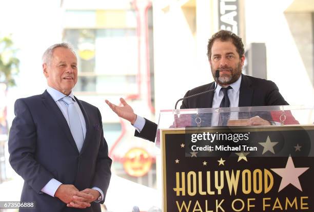 Wolfgang Puck and Brett Ratner attend the ceremony honoring Wolfgang Puck with a Star on The Hollywood Walk of Fame held on April 26, 2017 in...