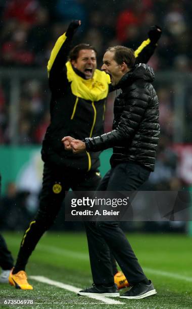 Thomas Tuchel, head coach of Dortmund celebrates victory after the DFB Cup semi final match between FC Bayern Muenchen and Borussia Dortmund at...