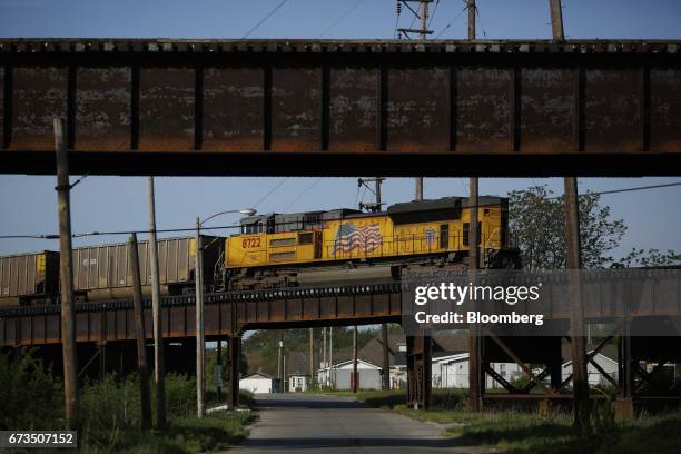 Union Pacific Corp. EMD SD-70ACe acting as a DPU brings up the rear of a coal train in East St. Louis, Illinois, U.S., on Tuesday, April. 25, 2017....