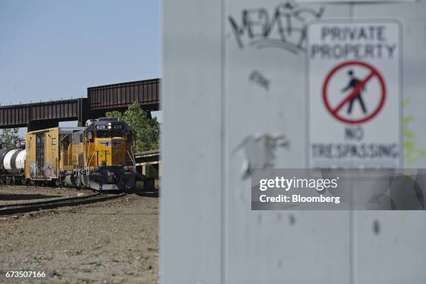 Union Pacific Corp. Freight train shoves a cut of cars back into a freight yard along the Mississippi River in St. Louis, Missouri, U.S., on Tuesday,...