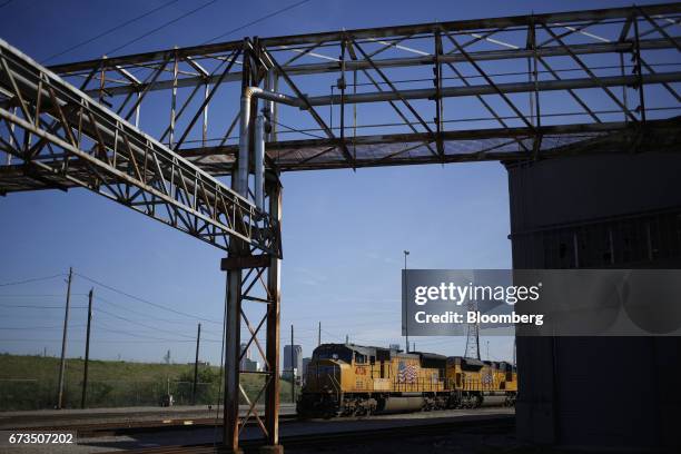 Union Pacific Corp. EMD SD70M locomotive sits parked in a rail yard long the Mississippi River in St. Louis, Missouri, U.S., on Tuesday, April. 25,...