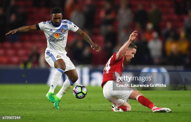 Jermain Defoe of Sunderland and Adam Forshaw of Middlesbrough in action during the Premier League match between Middlesbrough and Sunderland at the...