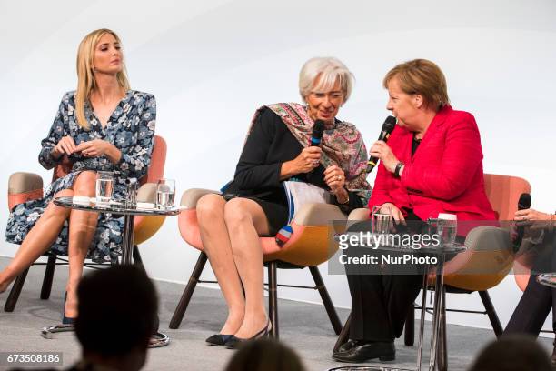 Managing Director of the International Monetary Fund Christine Lagarde , German Chancellor Angela Merkel and Daughter of US President Ivanka Trump...