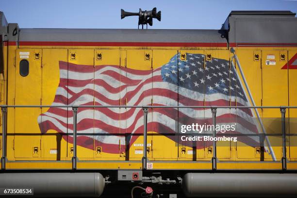 An American flag is painted on the side of a Union Pacific Corp. Freight locomotive in St. Louis, Missouri, U.S., on Tuesday, April. 25, 2017. Union...