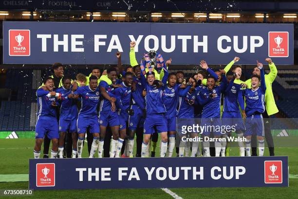 Mason Mount of Chelsea lifts the trophy as Chelsea celebrate victory in the FA Youth Cup Final, second leg between Chelsea and Mancherster City at...