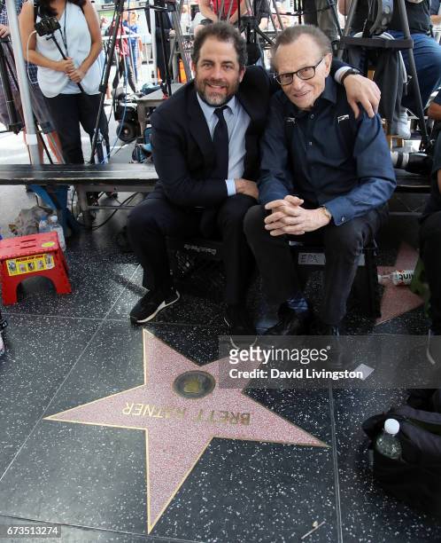 Director Brett Ratner and TV host Larry King attend Wolfgang Puck being honored with a Star on the Hollywood Walk of Fame on April 26, 2017 in...