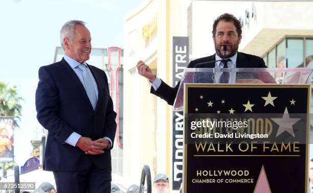 Chef Wolfgang Puck and director Brett Ratner attend Wolfgang Puck being honored with a Star on the Hollywood Walk of Fame on April 26, 2017 in...